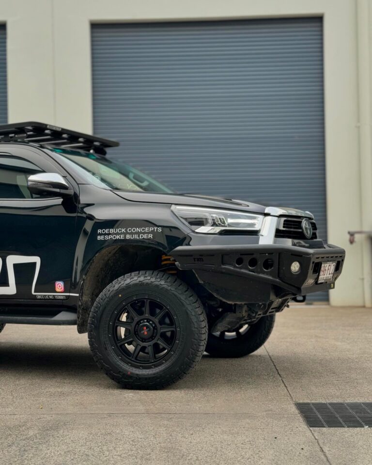 Toyota Hilux With Loaded Black Gunbarrel and Falken At3 Tyres